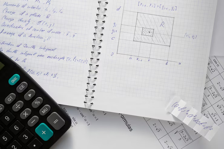 Student solving quadratic equations step by step with a calculator and notebook of math formulas