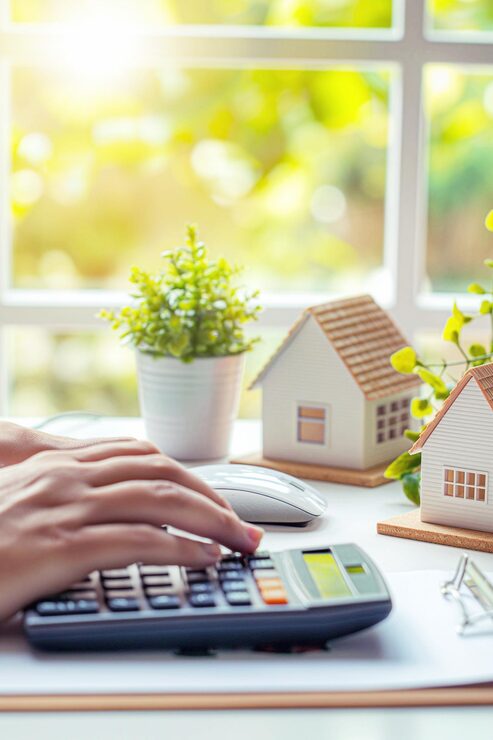 Biweekly vs monthly mortgage payments comparison with calculator and house model