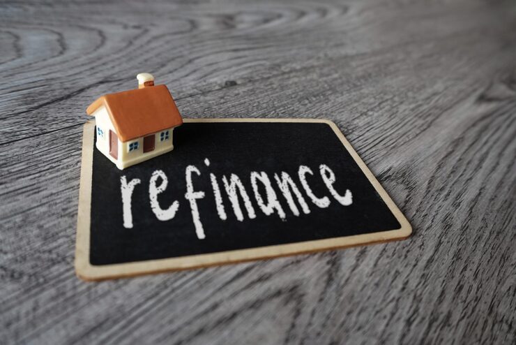 when to refinance mortgage house model on refinance chalkboard